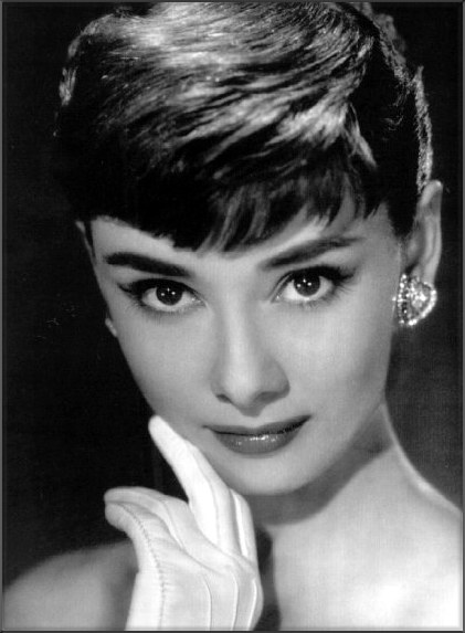 to me she reminds a bit of Audrey Hepburn